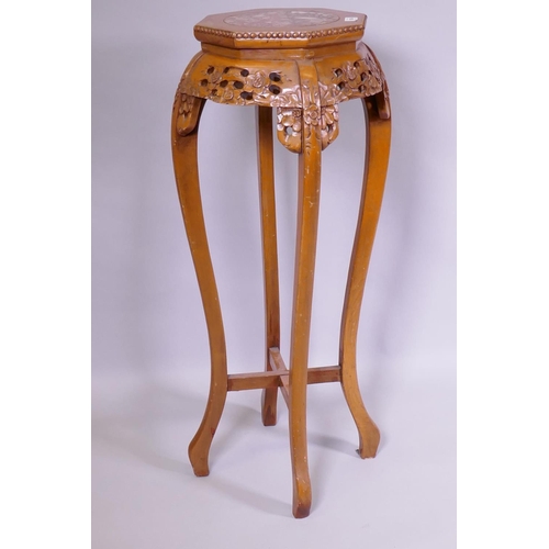 1140 - A Chinese vase stand with pierced frieze and inset marble top, 35cm diameter x 90cm