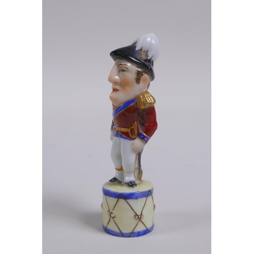 1 - A C19th porcelain pipe stopper/tamper in the form of Arthur Wellesley, 1st Duke of Wellington, AF re... 