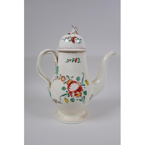 10 - A late C18th Staffordshire creamware teapot, cup and saucer, with flat reeded handles, flower moulde... 