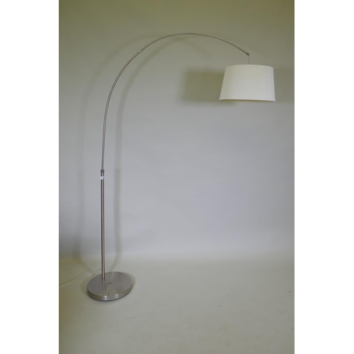 1145 - A contemporary brushed steel floor lamp, 180cm high