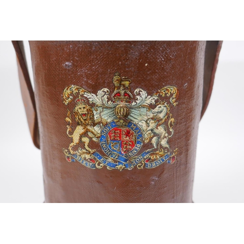 19 - A vintage leather and painted canvas shell case decorated with the Royal Coat of Arms, 34cm high