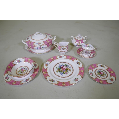 20 - A Royal Albert Lady Carlyle six place dinner and tea service, including tea cups and saucers, cake p... 