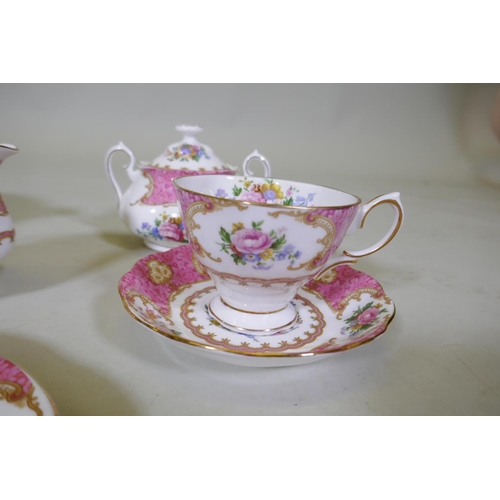 20 - A Royal Albert Lady Carlyle six place dinner and tea service, including tea cups and saucers, cake p... 