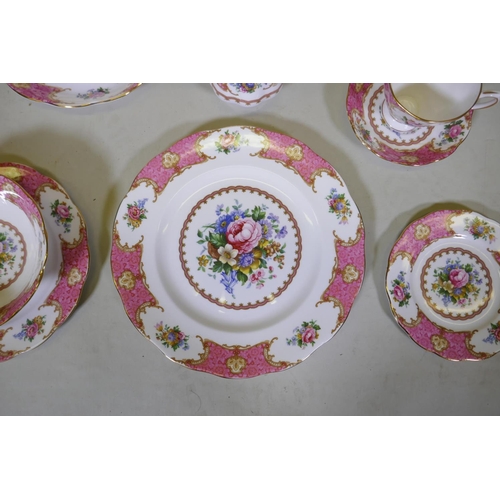 20 - A Royal Albert Lady Carlyle six place dinner and tea service, including tea cups and saucers, cake p... 