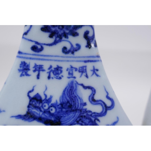 23 - A Chinese blue and white porcelain ewer with dragon decoration, Xuande 6 character mark to side, 27c... 