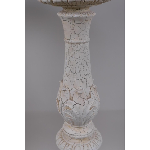 39 - A pair of painted composition pricket candlesticks, 54cm high