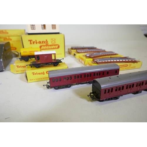 4 - A Tri-ang TT gauge train set, including Jinty loco, rolling stock, track, transformer and terrain, w... 