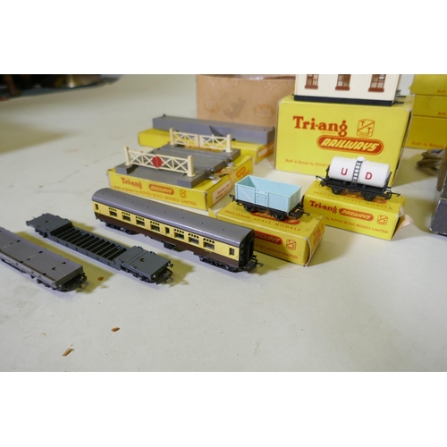 4 - A Tri-ang TT gauge train set, including Jinty loco, rolling stock, track, transformer and terrain, w... 