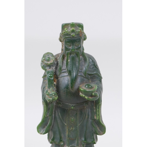 43 - A Chinese green hardstone carving of the deity Lu, 20cm high