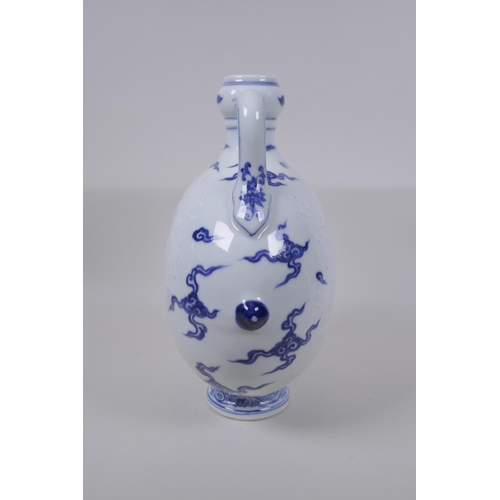 45 - A blue and white porcelain two handled mon flask with dragon decoration, Chinese Xuande 6 character ... 