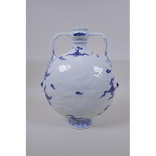 45 - A blue and white porcelain two handled mon flask with dragon decoration, Chinese Xuande 6 character ... 