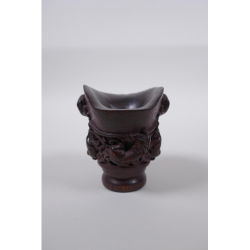 48 - A Chinese bamboo libation cup with kylin decoration, impressed seal mark to base, 8cm high