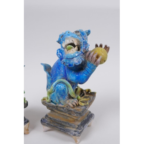 53 - A pair of Chinese turquoise glazed porcelain figure of kylin, 14cm high