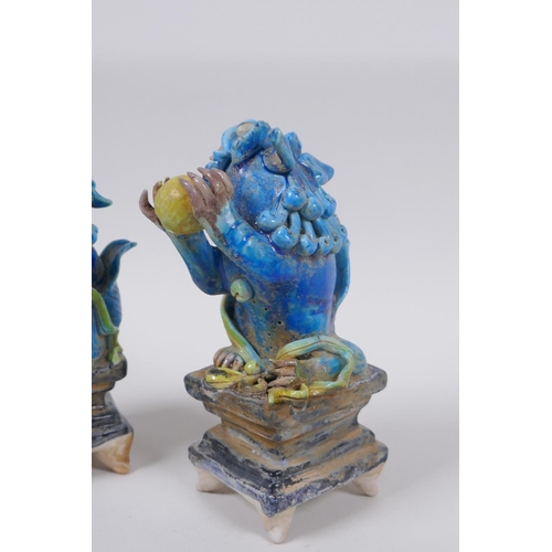 53 - A pair of Chinese turquoise glazed porcelain figure of kylin, 14cm high