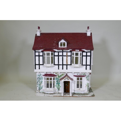 66 - A scratch built dolls' house cottage, 68 x 42cm, 77cm high