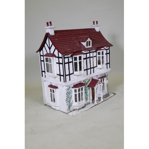 66 - A scratch built dolls' house cottage, 68 x 42cm, 77cm high