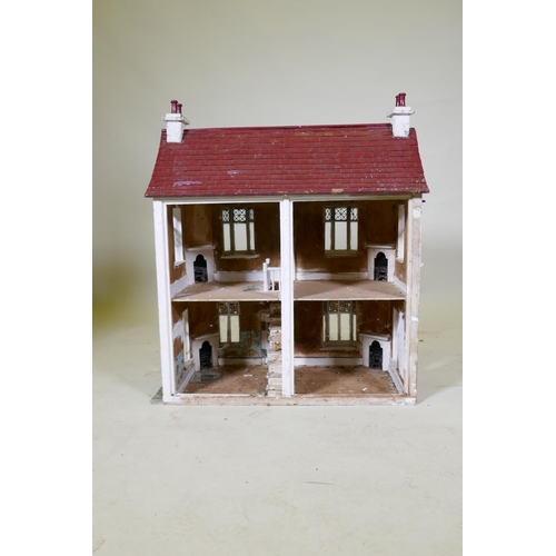 66 - A scratch built dolls' house cottage, 68 x 42cm, 77cm high