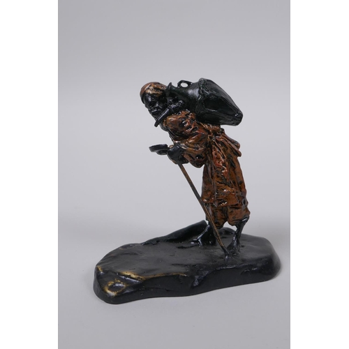 74 - A Bergman style cold painted bronze of an Arab watercarrier, 8cm high