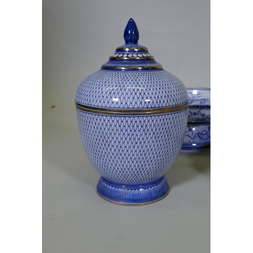 82 - A collection of oriental porcelain with blue and white decoration, including footed bowls, jars and ... 