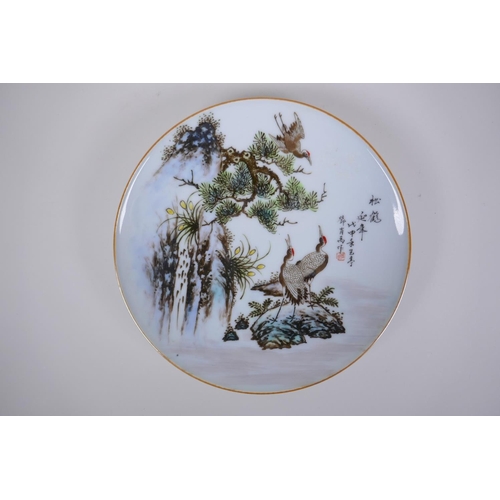 85 - A Chinese Republic style porcelain cabinet plate decorated with red crowned cranes, inscription to t... 