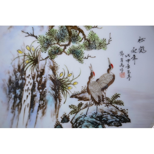 85 - A Chinese Republic style porcelain cabinet plate decorated with red crowned cranes, inscription to t... 