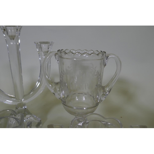 86 - A pair of Nachtmann three branch crystal glass candelabra, 28cm high, crystal glass bowls, decanter ... 