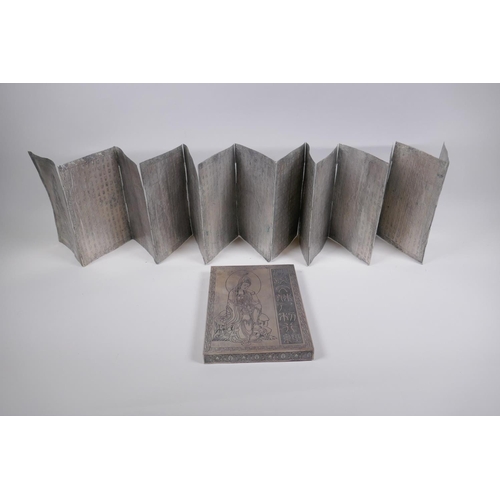 88 - A Chinese white metal box containing a metal leaved concertina book with repousse inscriptions, 15 x... 