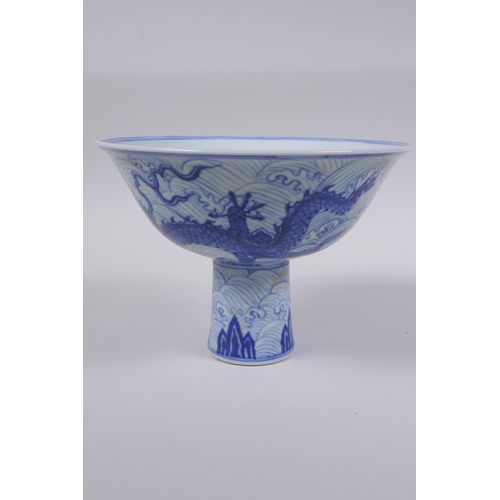 93 - A blue and white porcelain stem bowl with dragon decoration, Chinese Xuande 6 character mark to bowl... 