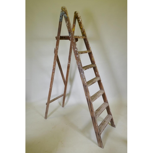 1105 - A vintage pine decorators's step ladder, 200cm long