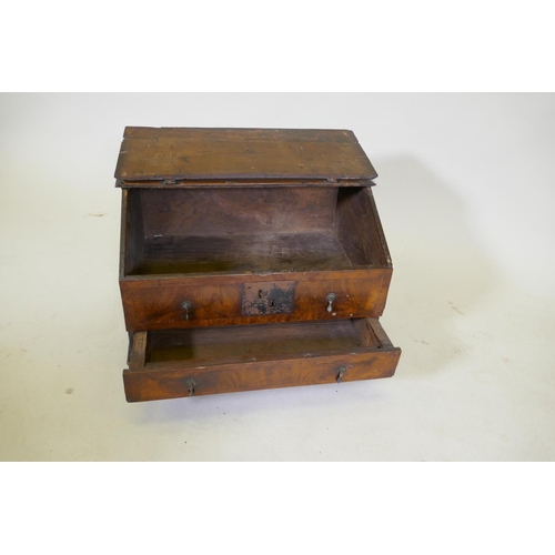 1107 - An early C18th walnut bible box with fall front and single drawer, raised on bracket supports, adapt... 