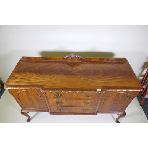 1116 - A Maples mahogany breakfront sideboard, with three drawers flanked by two doors, raised on cabriole ... 