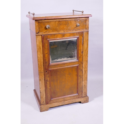 1112 - A Victorian burr walnut side cabinet with single drawer over a mirrored door and cupboard with three... 