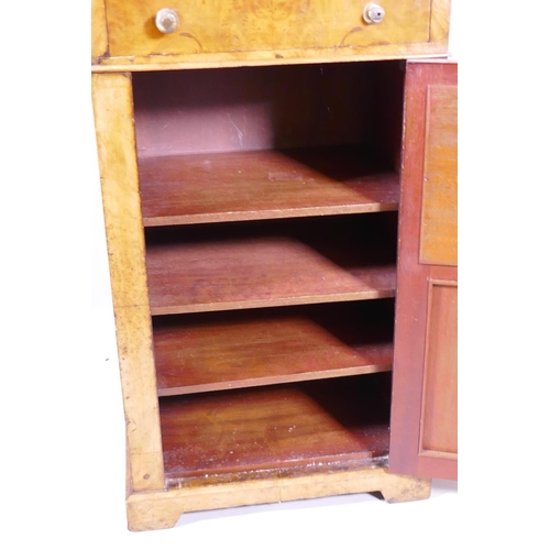 1112 - A Victorian burr walnut side cabinet with single drawer over a mirrored door and cupboard with three... 