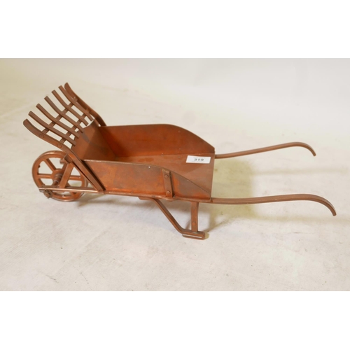 244 - A well constructed copper model of a wheelbarrow, 17