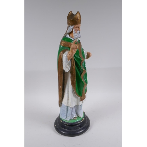 252 - A painted plaster figure of a bearded priest, 46cm high, AF