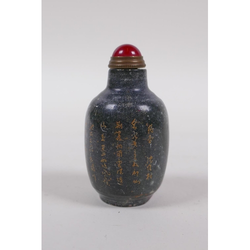 100 - A Chinese mottled hardstone snuff bottle with chased and gilt character inscription, mark to base, 7... 