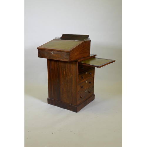 1022 - A Victorian rosewood davenport desk, with three quarter gallery and covered inkwell compartment, sli... 