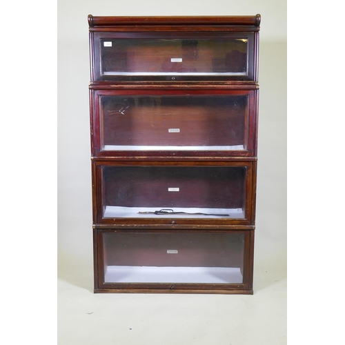 1025 - A mahogany Globe Wernicke bookcase of four sections, the upper stepped, lacks base, 87 x 29 x 48cm