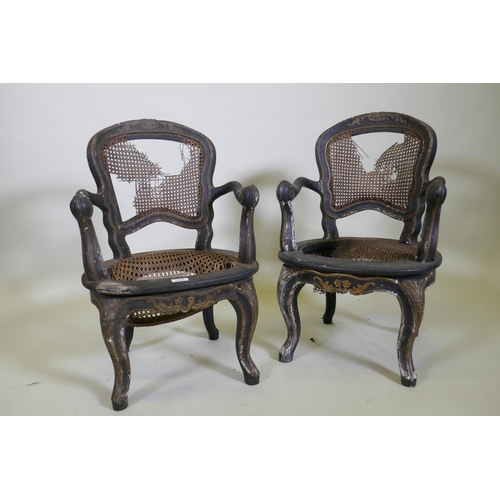 1033 - A pair of C18th/C19th child's elbow chairs with lacquered and carved parcel gilt decoration, possibl... 