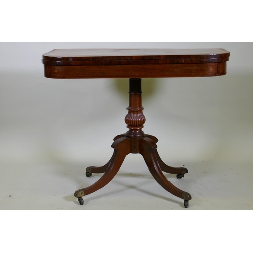 1034 - A Regency rosewood card table with satinwood inlaid borders, fold over top and inlaid frieze, raised... 