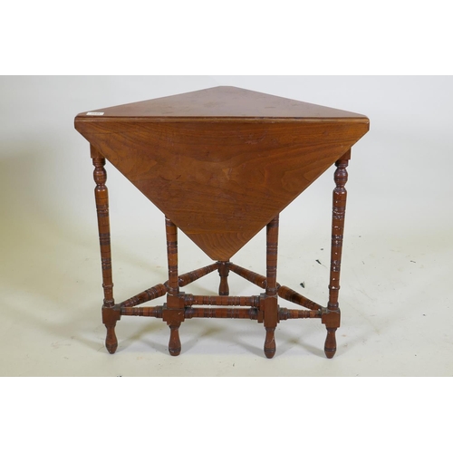 1045 - A Victorian walnut corner occasional table with drop leaf, 69 x 37 x 65cm