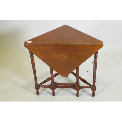 1045 - A Victorian walnut corner occasional table with drop leaf, 69 x 37 x 65cm