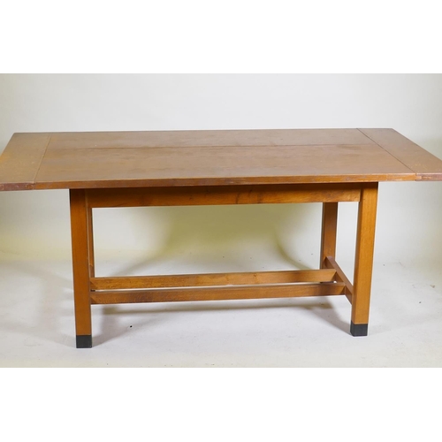 1046 - A bespoke Arts & Crafts style oak refectory table with cleated end plank top raised on square su... 