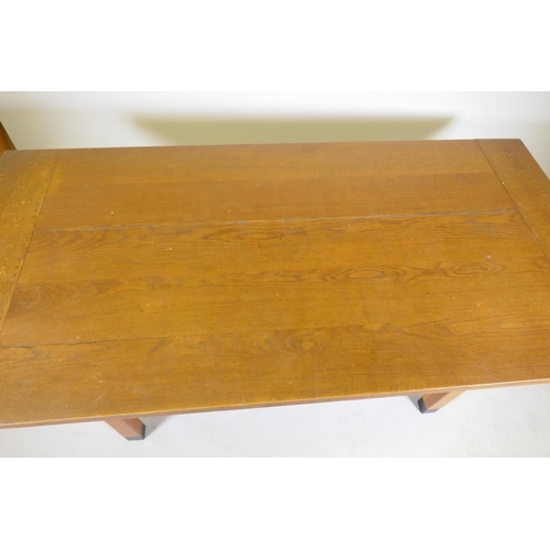 1046 - A bespoke Arts & Crafts style oak refectory table with cleated end plank top raised on square su... 