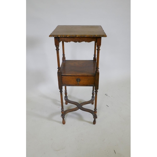 1049 - A Georgian style oak night stand with shaped top and single drawer to undertier, raised on turned su... 