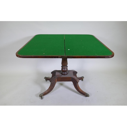 1052 - A Regency rosewood card table with Zebra wood crossbanded top, raised on a turned column with raised... 