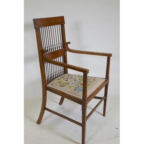 1057 - An C18th Chippendale style walnut chair with pierced splat back, raised on square supports and later... 