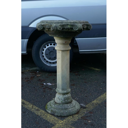 1062 - A reconstituted stone bird bath, 90cm high, 54cm diameter, AF