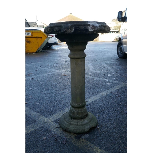 1062 - A reconstituted stone bird bath, 90cm high, 54cm diameter, AF