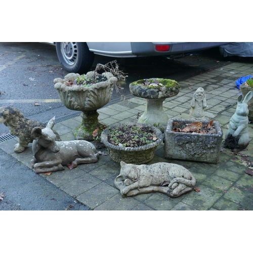 1063 - A quantity of reconstituted stone composition and concrete garden figures, planters and bird bath, A... 